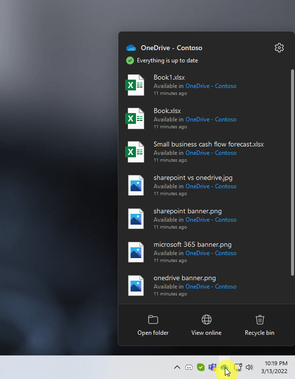 Click on the OneDrive icon on the taskbar