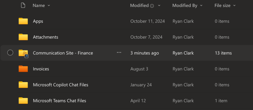 Screenshot of Windows File Explorer showing synced folders including a SharePoint communication site library shortcut under OneDrive