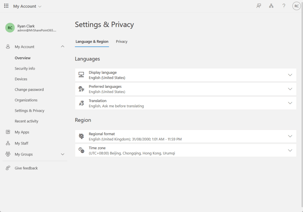 Screenshot of the Microsoft 365 Settings & Privacy page showing Language & Region settings with display language set to English (United States), regional format set to English (United Kingdom), and time zone set to UTC+08:00 Beijing, Chongqing, Hong Kong, Urumqi.