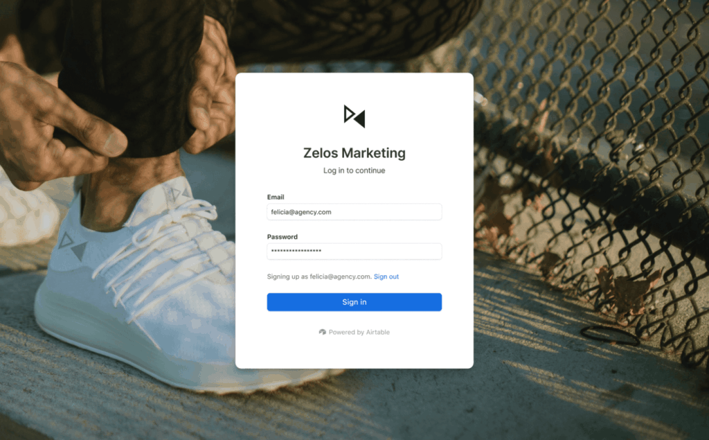 A login screen for Zelos Marketing appears in the foreground with fields for email and password. In the background, a person kneels to tie the laces of a white sneaker next to a chain-link fence in sunlight.